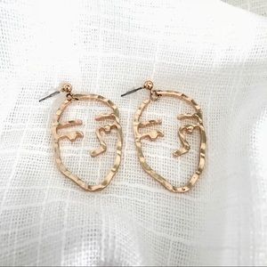 face earrings